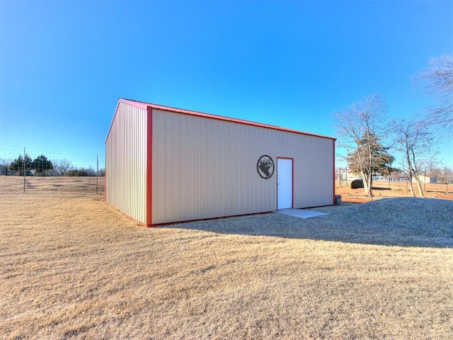 view of outdoor structure with a yard