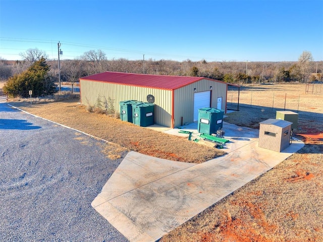 view of outdoor structure with a garage