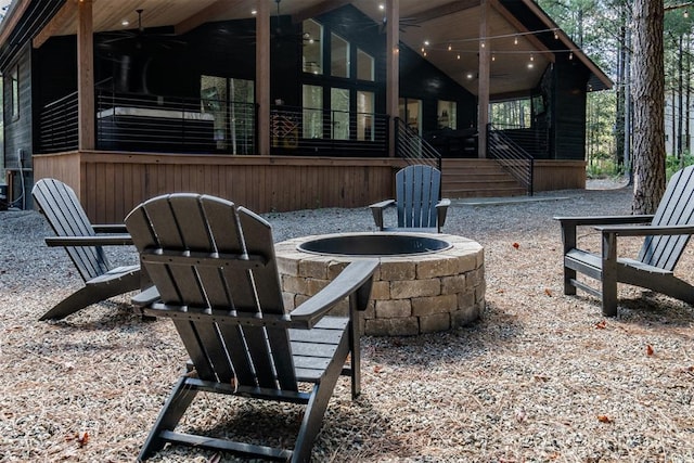 view of patio featuring an outdoor fire pit