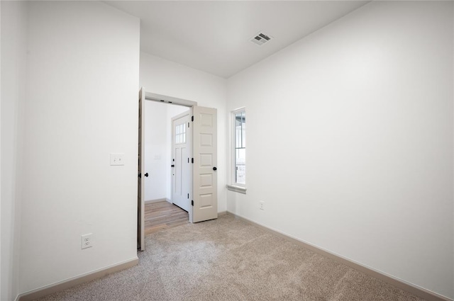4813 Mistywood Ln, Mustang, OK 73064 - spare room with light colored carpet and baseboards