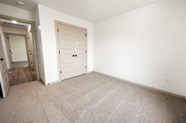 4813 Mistywood Ln, Mustang, OK 73064 - unfurnished bedroom with carpet, baseboards, and a closet