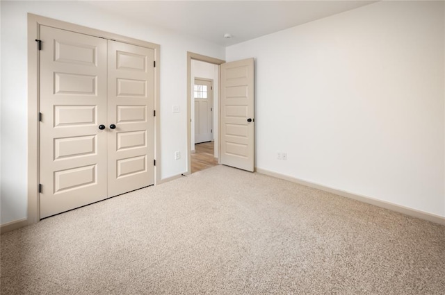 4813 Mistywood Ln, Mustang, OK 73064 - unfurnished bedroom with carpet floors, baseboards, and a closet