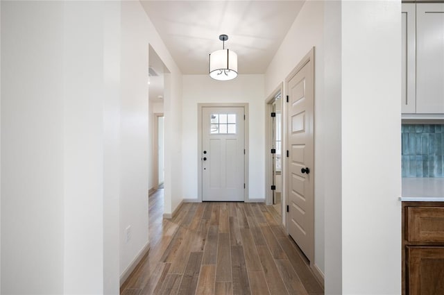 4813 Mistywood Ln, Mustang, OK 73064 - entryway featuring wood finished floors and baseboards