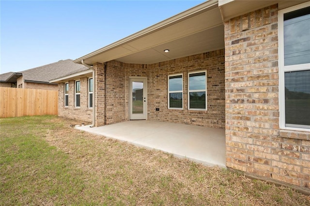 4813 Mistywood Ln, Mustang, OK 73064 - rear view of property featuring brick siding and a patio area