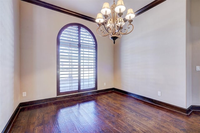 unfurnished room with crown molding, dark wood-type flooring, and a chandelier