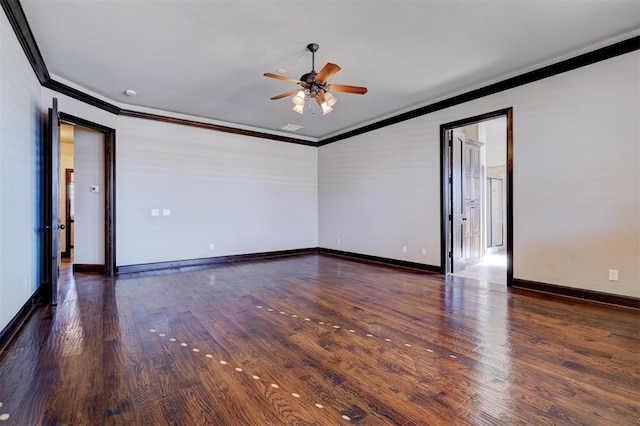 spare room featuring ceiling fan, crown molding, and dark wood-type flooring