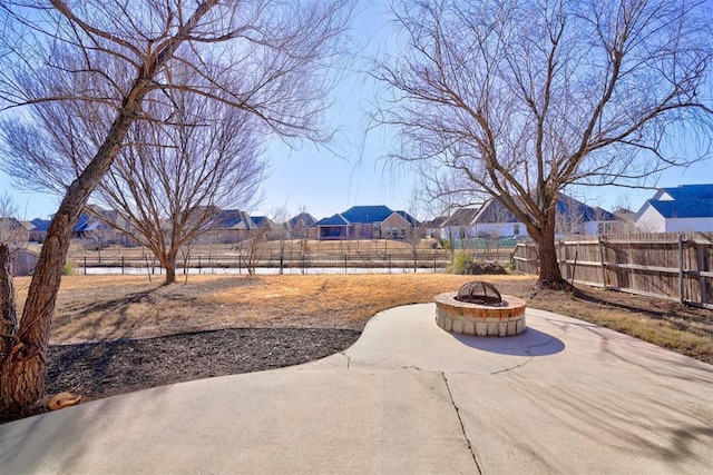 view of patio featuring an outdoor fire pit