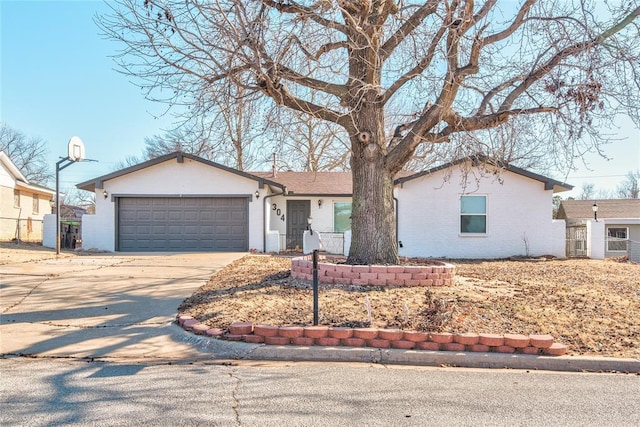 single story home with a garage