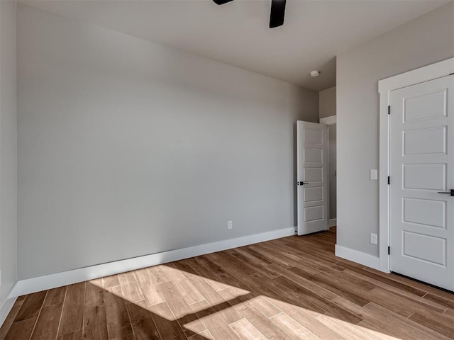 unfurnished bedroom with light wood-type flooring and ceiling fan