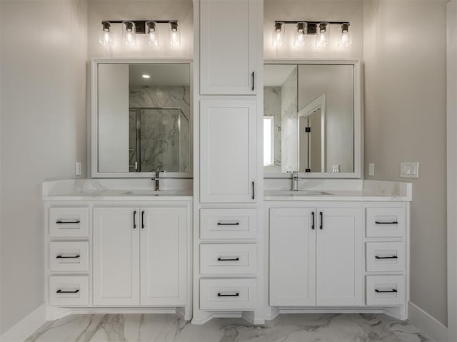 bathroom featuring vanity and a shower with door