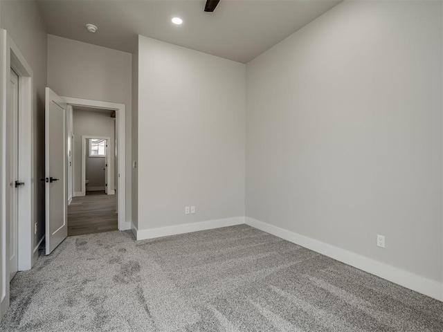 unfurnished room with carpet floors