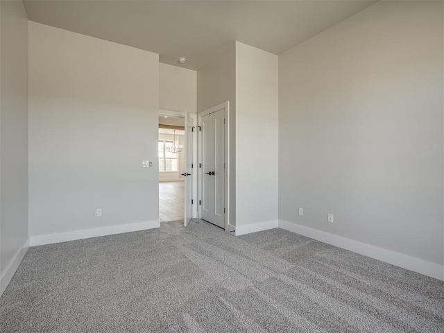 unfurnished room featuring carpet floors