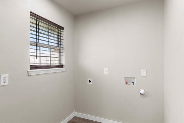 washroom with hookup for a washing machine, wood-type flooring, and electric dryer hookup