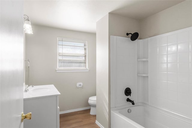 full bathroom with wood-type flooring, toilet, shower / bathing tub combination, and vanity