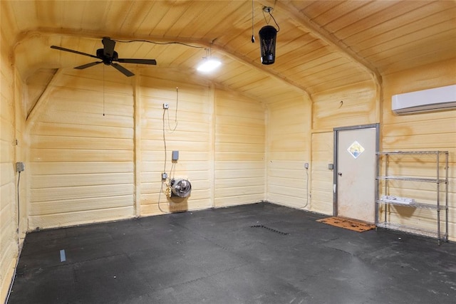 interior space featuring a wall mounted air conditioner, ceiling fan, and wood ceiling