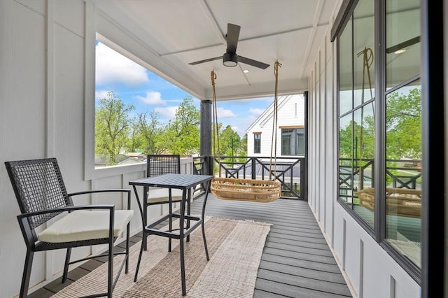 exterior space featuring ceiling fan