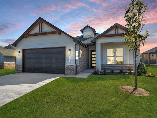 craftsman-style home with a garage and a lawn