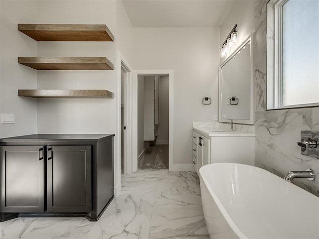 bathroom with vanity and a bathing tub