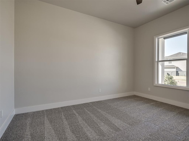 unfurnished room featuring carpet floors