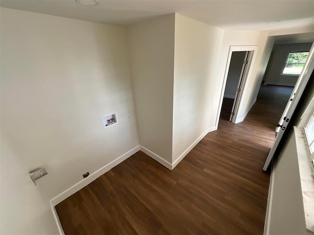 laundry area with washer hookup and dark wood-type flooring