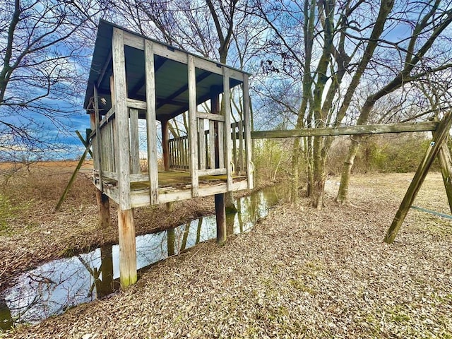 exterior space with a water view