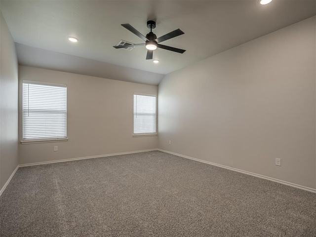 carpeted spare room featuring baseboards, recessed lighting, and ceiling fan