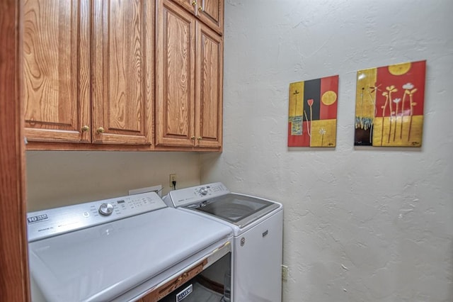 344 Millbrook Dr, Norman, OK 73072 - laundry area featuring cabinets and separate washer and dryer