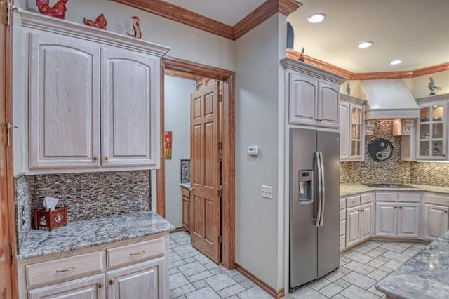 344 Millbrook Dr, Norman, OK 73072 - kitchen featuring backsplash, stainless steel fridge, ornamental molding, and custom range hood