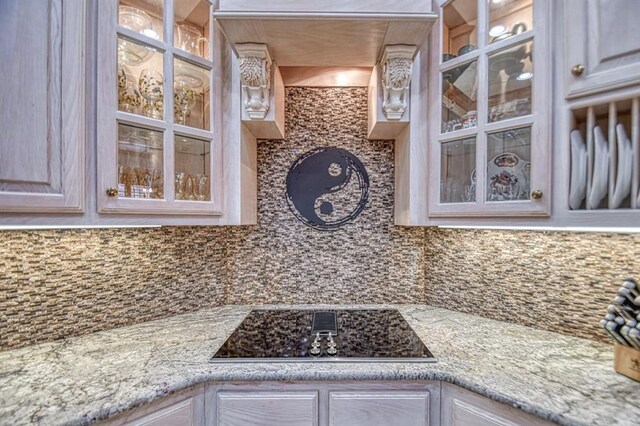 344 Millbrook Dr, Norman, OK 73072 - kitchen with black electric cooktop and decorative backsplash