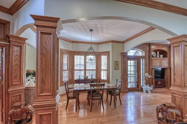 344 Millbrook Dr, Norman, OK 73072 - dining room with an inviting chandelier, ornamental molding, decorative columns, and light wood-type flooring