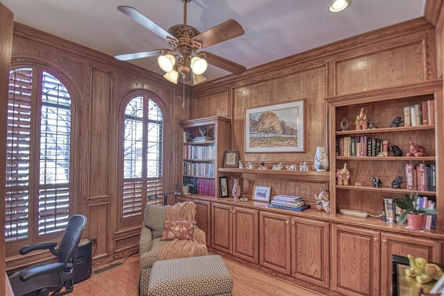 344 Millbrook Dr, Norman, OK 73072 - office area featuring light hardwood / wood-style flooring, ceiling fan, and wood walls