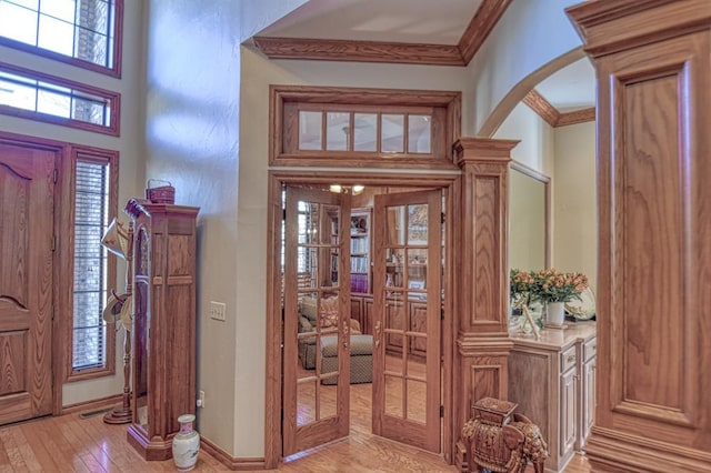 344 Millbrook Dr, Norman, OK 73072 - entryway featuring light hardwood / wood-style flooring and ornamental molding