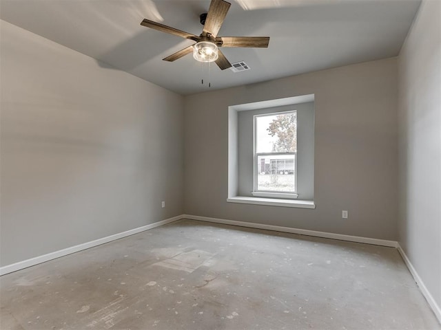 spare room with ceiling fan