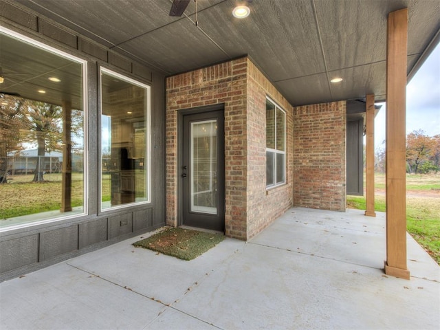 property entrance featuring a patio