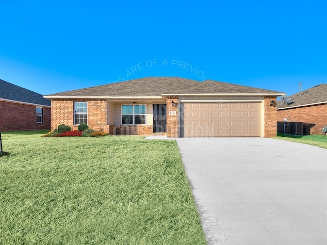 ranch-style house with a front yard, central AC, and a garage