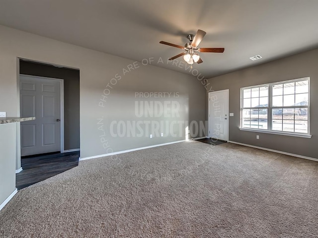 carpeted empty room featuring ceiling fan