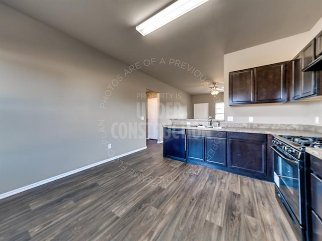 kitchen with dark brown cabinetry, black appliances, sink, dark hardwood / wood-style floors, and ceiling fan