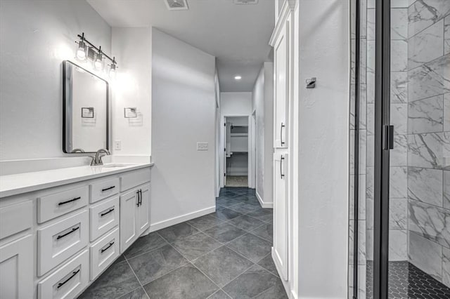 bathroom featuring vanity, tile patterned floors, and an enclosed shower