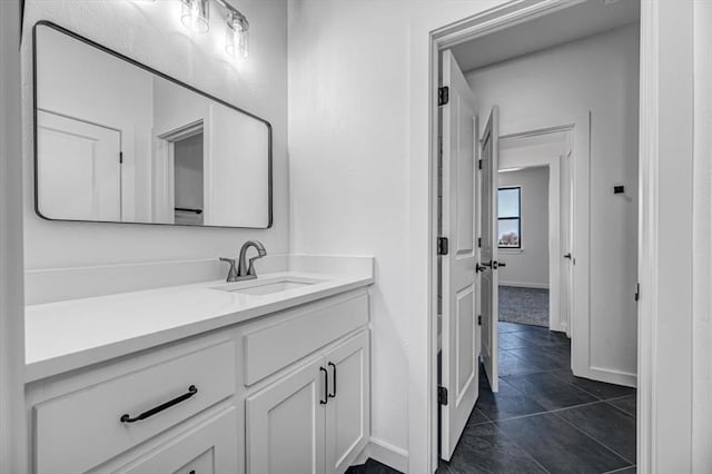 bathroom featuring tile patterned floors and vanity