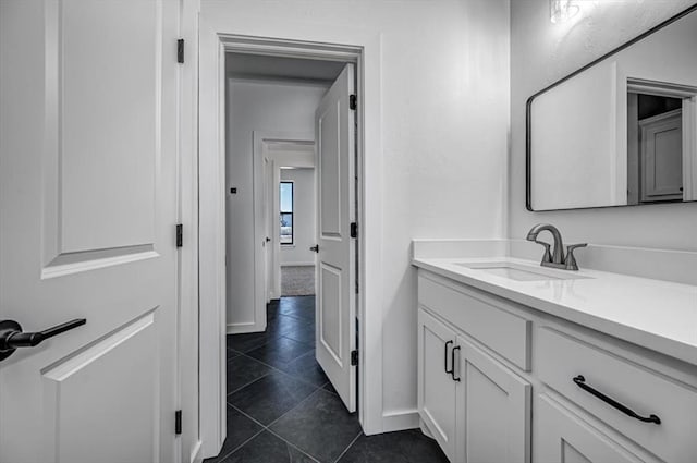 bathroom featuring tile patterned floors and vanity