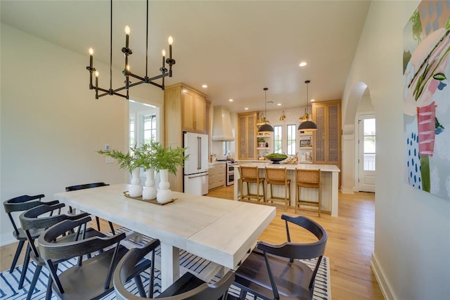 dining space with light wood-type flooring