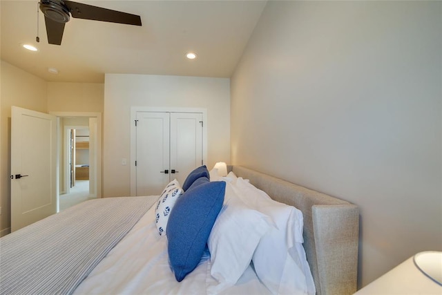 bedroom with ceiling fan and a closet