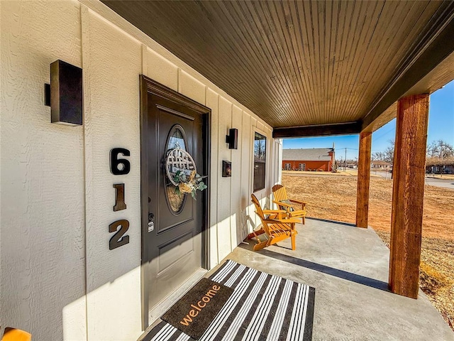 doorway to property with a porch