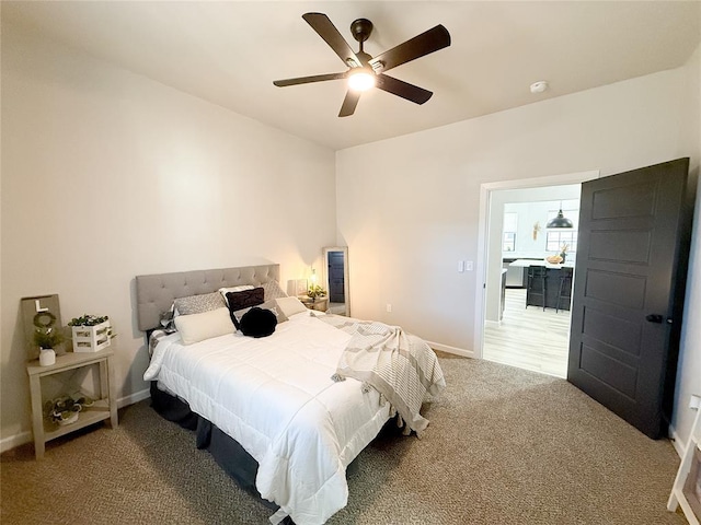 bedroom featuring ceiling fan and carpet floors