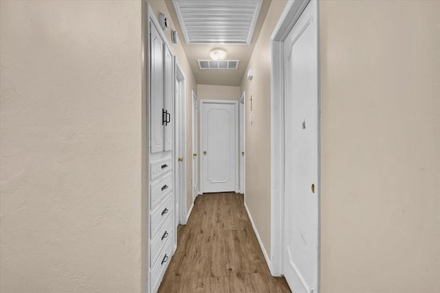 hall featuring light wood-type flooring