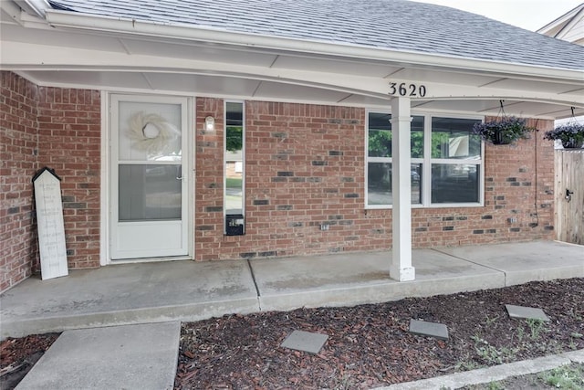 doorway to property with a patio area