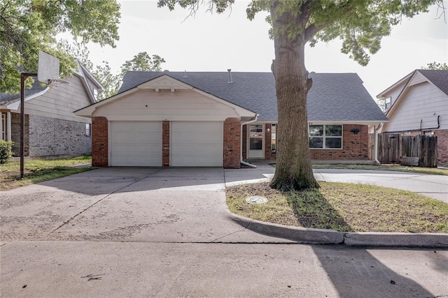 single story home featuring a garage