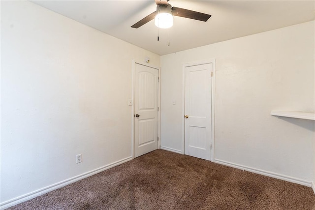 unfurnished room with carpet flooring and ceiling fan