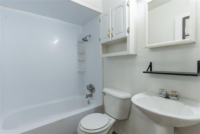 full bathroom featuring sink,  shower combination, and toilet