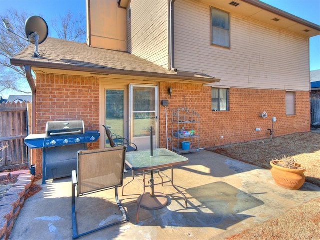 rear view of house featuring a patio